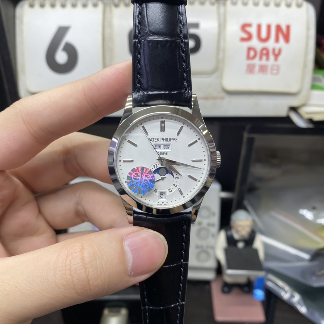 Patek Philippe Complicated Chronograph Series 5396G-011, white dial, Day Month Date and Moon Phase Complications function, 38.5mm Size.