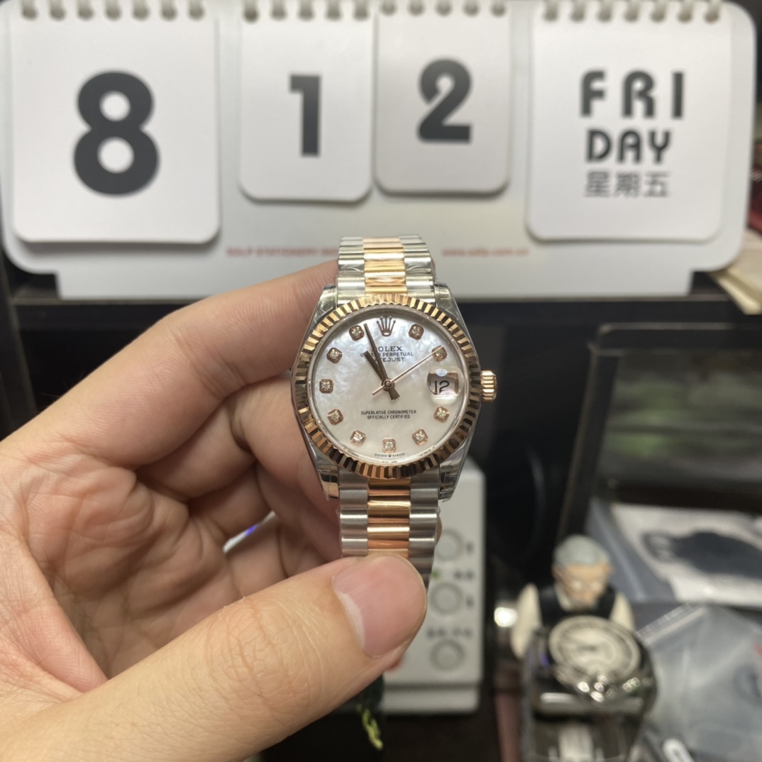 Rolex Series m278273-0027, Mother-of-Pearl Dial with Gold Fluted Bezel Five-Piece Pearl Bracelet, 31mm Size.