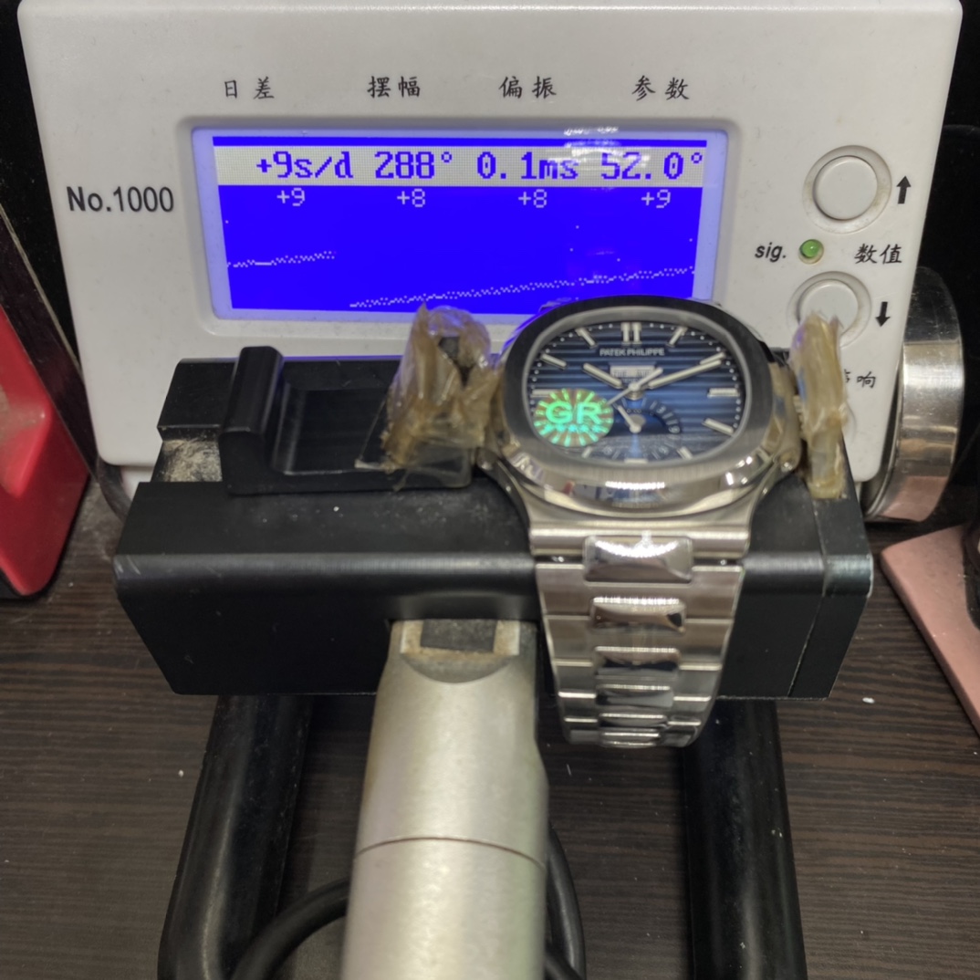 Patek Philippe Nautilus series 57261A-014, Blue Dial Steel Bracelet, Moon Phase Calendar Central Month and Week Display, 40.5mm Size.