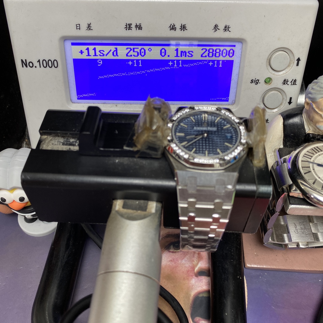 Audemars Piguet Royal Oak Offshore Series 77451ST.ZZ.1361ST.04, Blue Dial Gem-Set Bezel Mechanical Movement, 34mm Size.