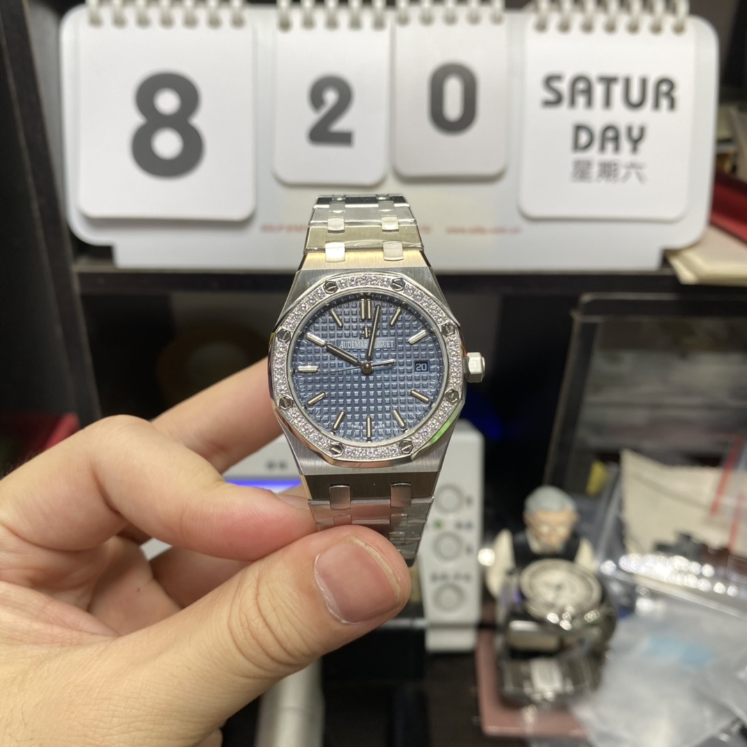 Audemars Piguet Royal Oak Offshore Series 77451ST.ZZ.1361ST.04, Blue Dial Gem-Set Bezel Mechanical Movement, 34mm Size.