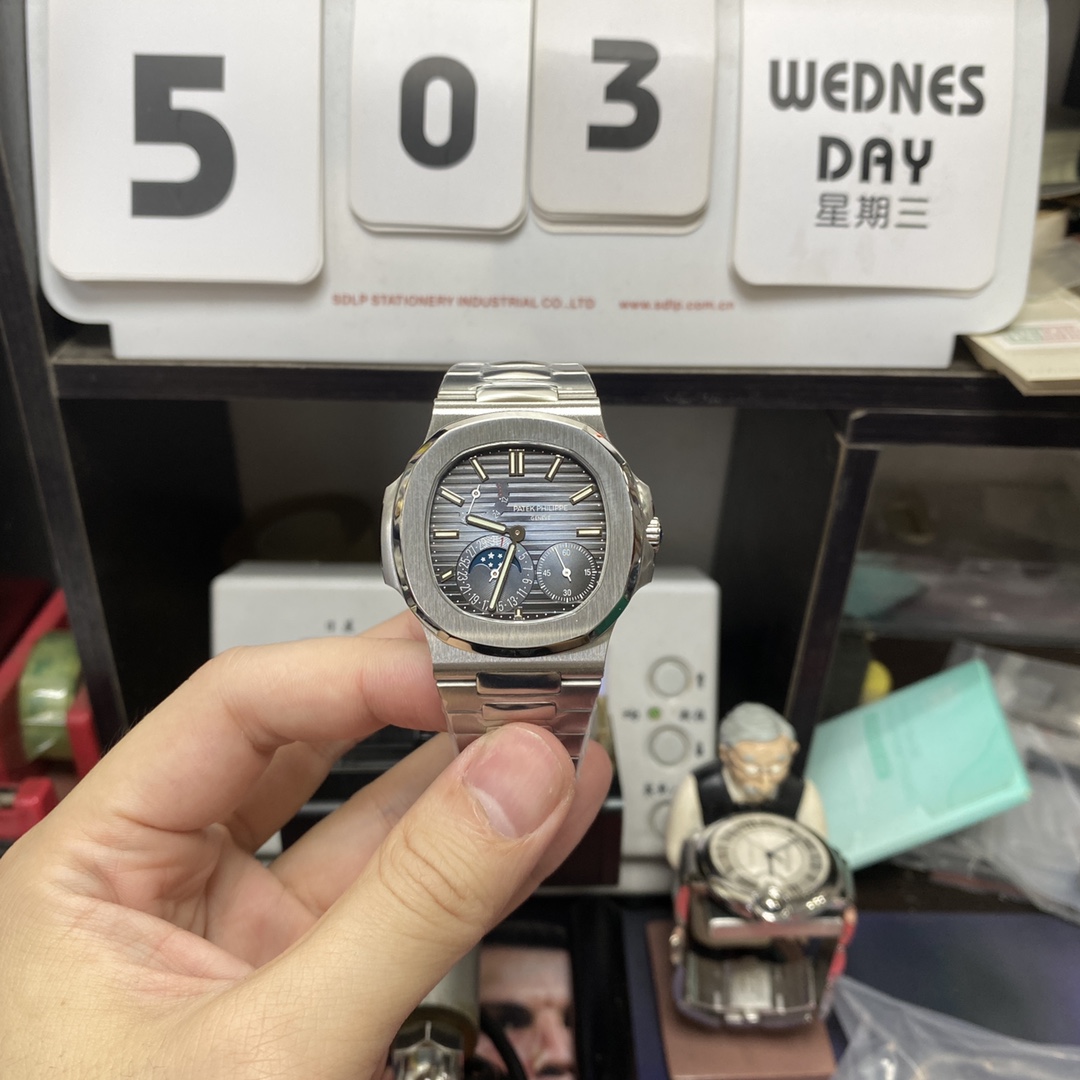 Patek Philippe Nautilus series 57121A-001, Blue Dial Steel Bracelet, Synchronized Functions, 40mm size.