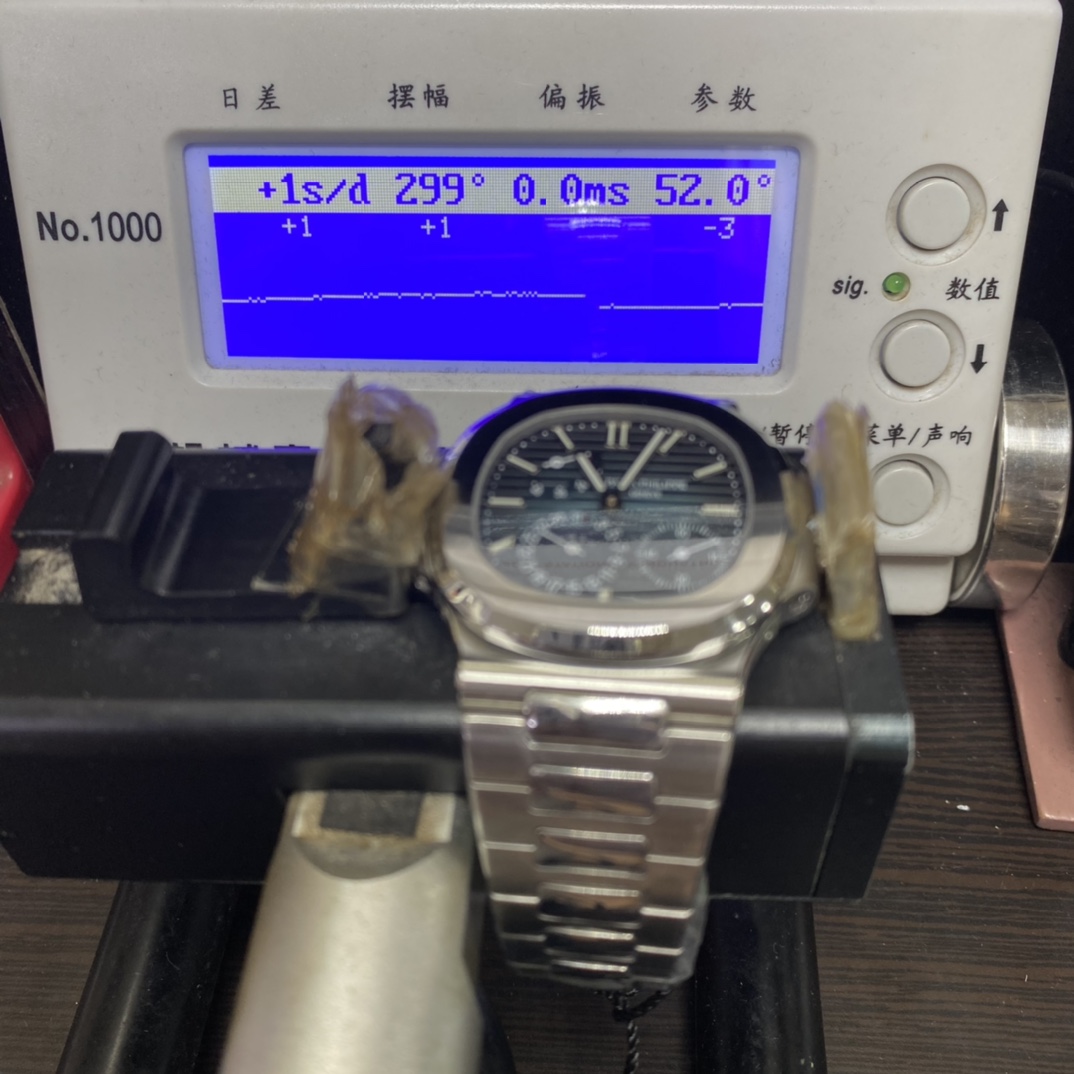 Patek Philippe Nautilus series 57121A-001, Blue Dial Steel Bracelet, Synchronized Functions, 40mm size.