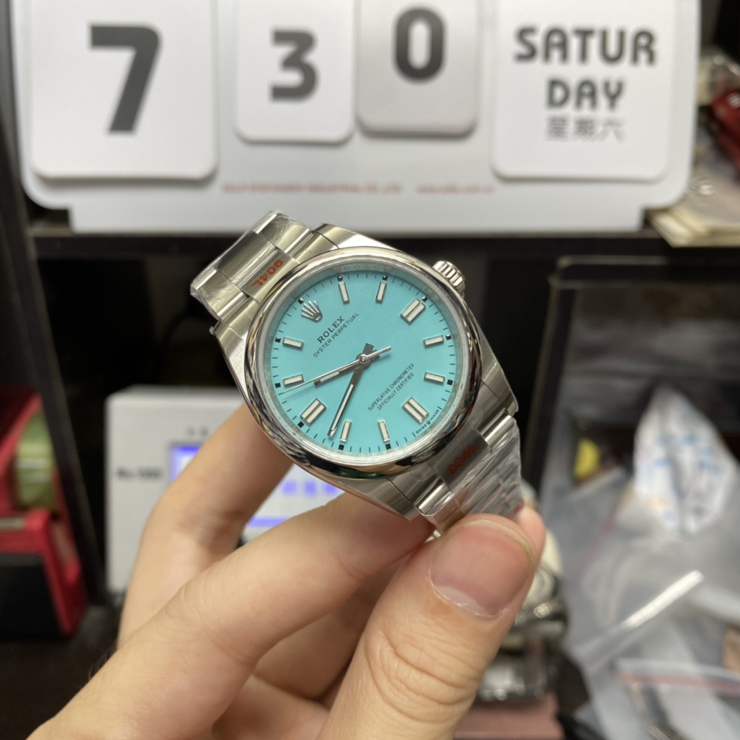 Rolex Oyster Perpetual Series m126000-0006, Tiffany Blue Dial, 36mm size.