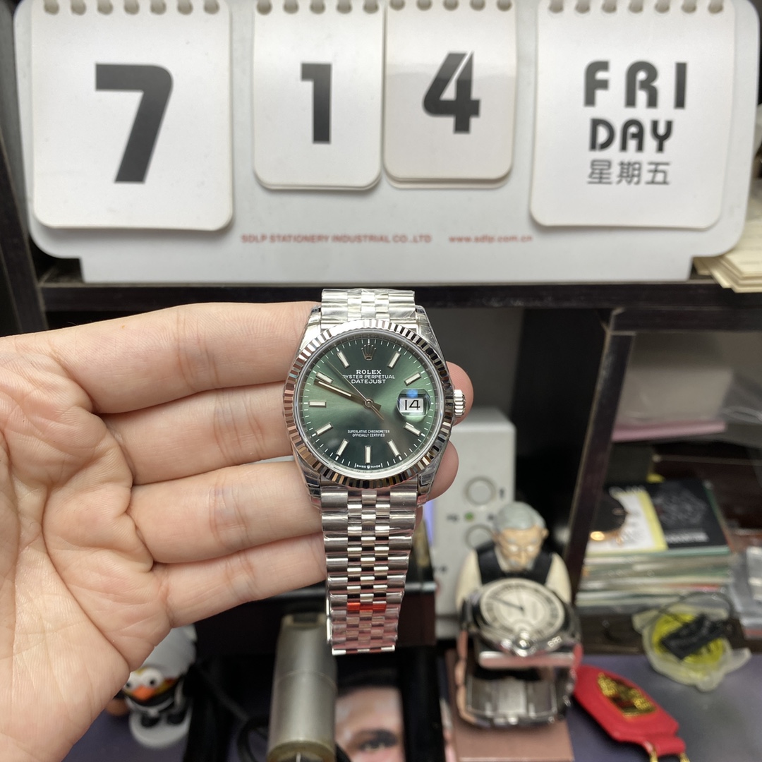 Rolex Datejust series m126234-0051, Mint Green Dial with Fluted Bezel, 36mm size.