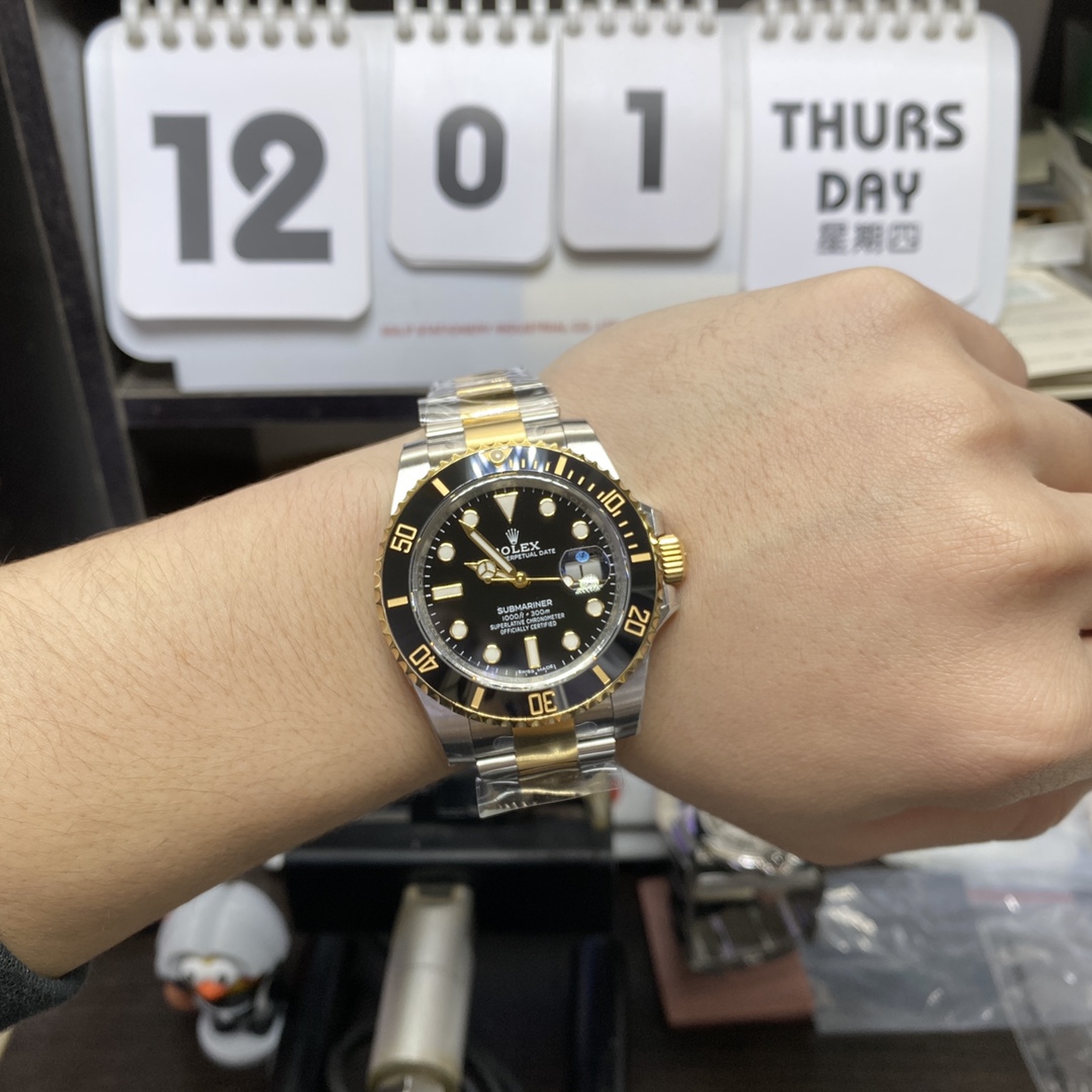 Rolex Submariner Series 116613LN-0001, Two-Tone Black Submariner, 40mm size.