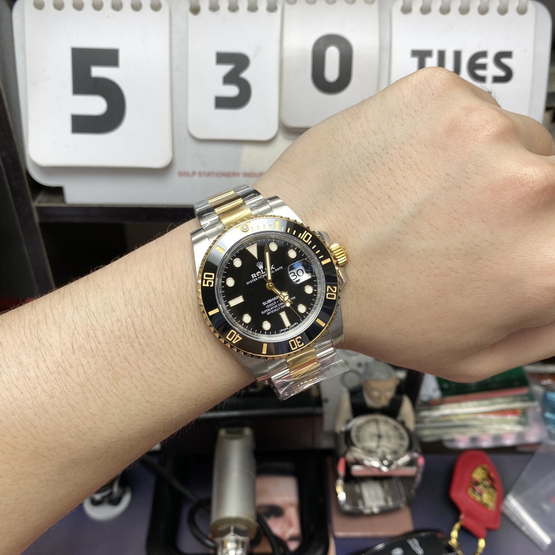 Rolex Submariner Series 116613LN-0001, Two-Tone Black Submariner, 40mm size.